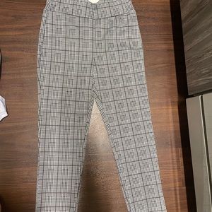 Patterned black designed dress pants.